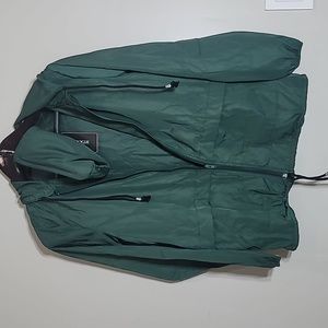 Raincoat small with bag. New with tags . Avoogue.